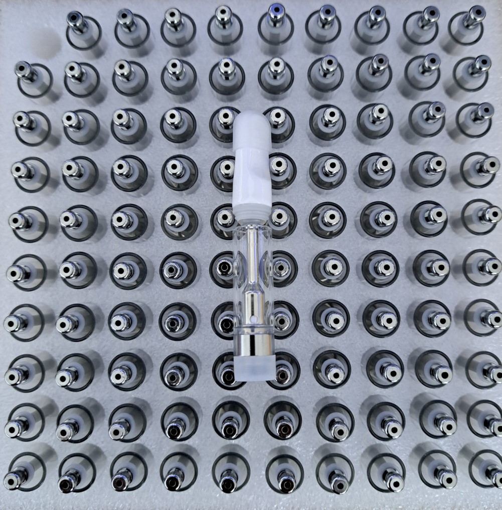A large number of V4-SS - White Tip -1ml cigs in a white tray.