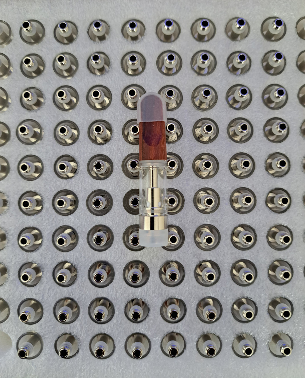 A V4 - Wood Tip - 0.5ml bottle with metal pins.