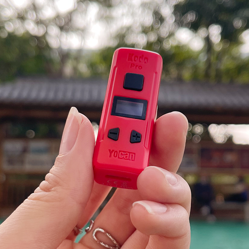 A person holding a Yocan Kodo Pro Battery.